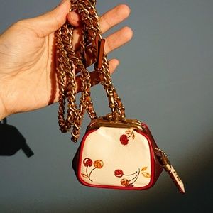 Coach 1941 Cherry print Kiss lock necklace pouch